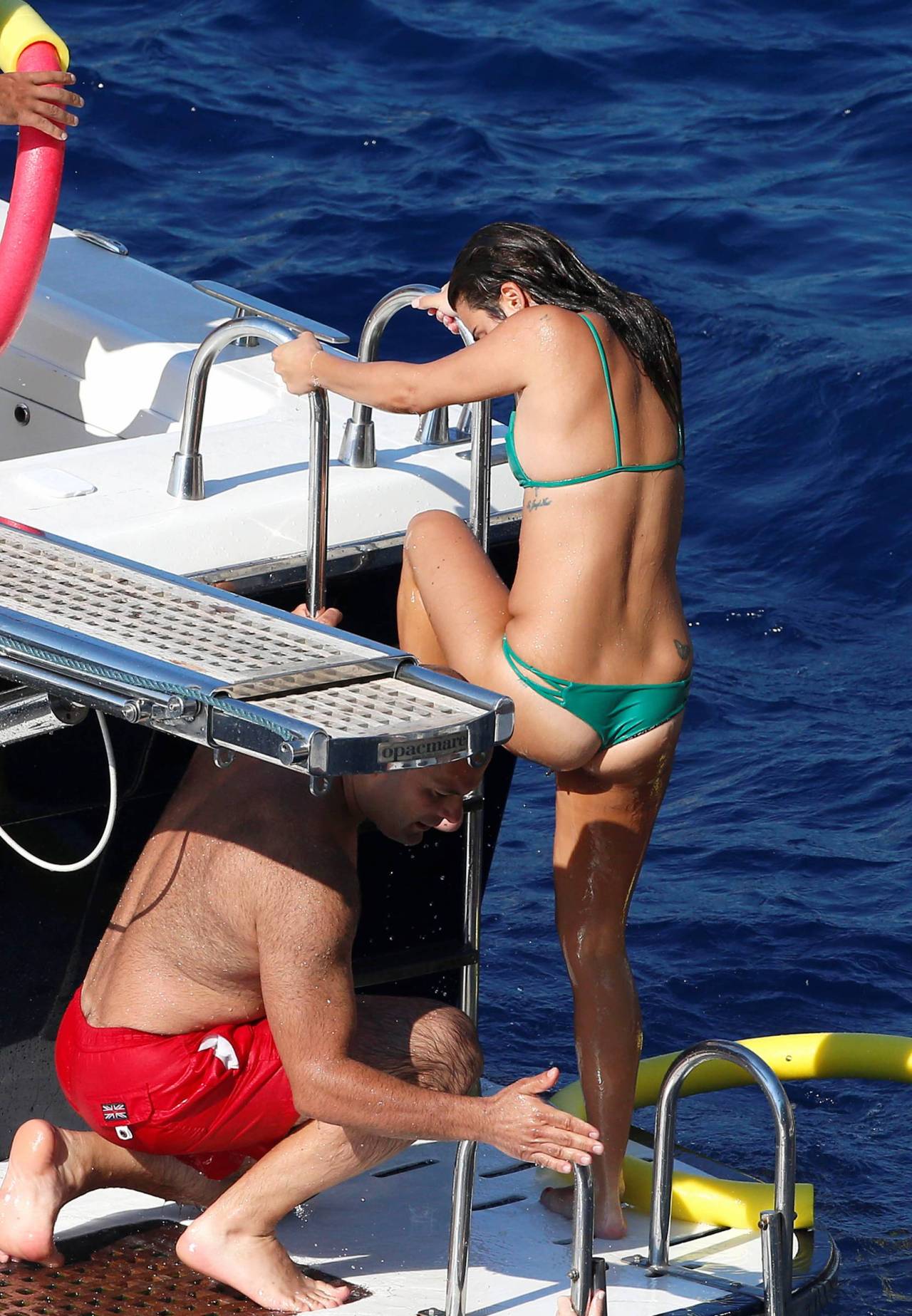 toplessbeachcelebs:  Lea Michele (Actress) nipple slip while swimming in Italy