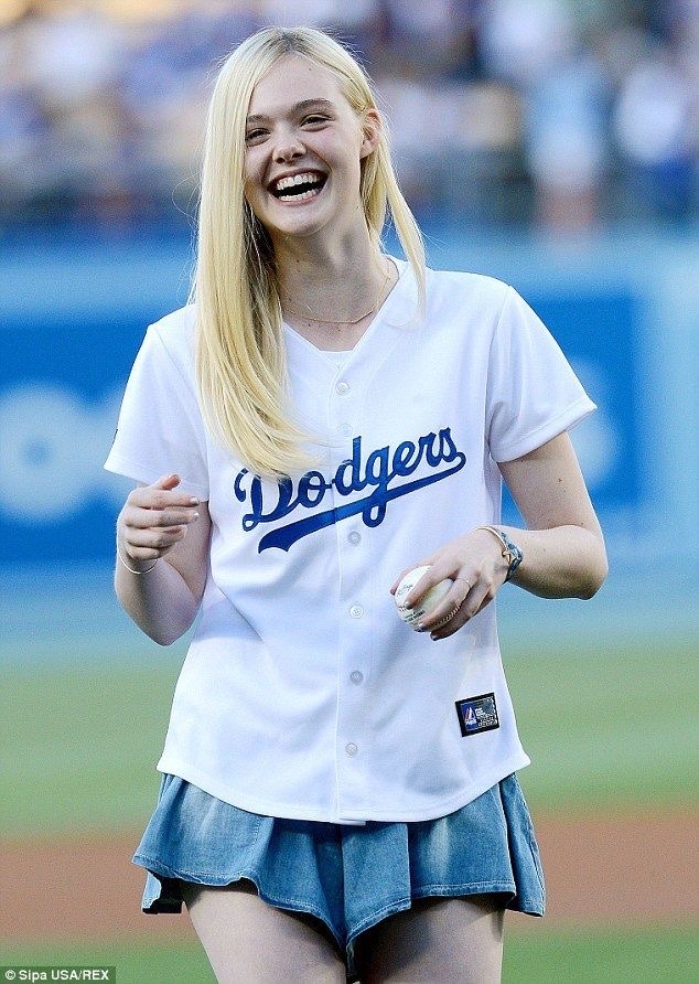 elle fanning throws the first pitch at a dodgers game