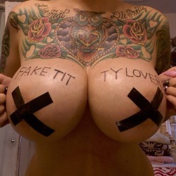 musclesandimplants:  implantlover:  Fake tit indeed  I hate tats but loving this