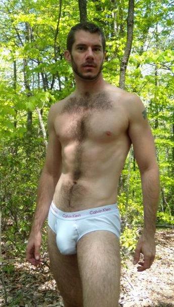 i love that bulge on this hairy guy standing in the woods with his white briefs. so sexy!follow for 