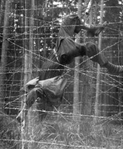 historicaltimes:  Miroslav Svatoň, age 22, dead on a barbed wire fence on the Czechoslovakia-Germany border, May 16, 1953 via reddit 