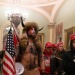 margridarnauds:headspace-hotel:loptrcoptr:loptrcoptr:Hey! Y’all know that dumb fuck with the fluffy horned hat on, running around shirtless inside the capitol? This guy?He has tattooed on his chest the valknutr (funky triangles), Yggdrasil (the tree