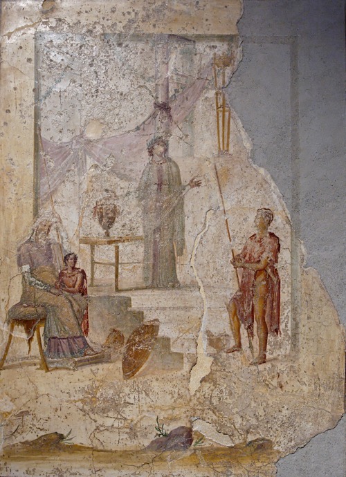 Cassandra prophesies the fall of Troy to Priam, Paris, and Hector.  Fresco in the Third Style from P