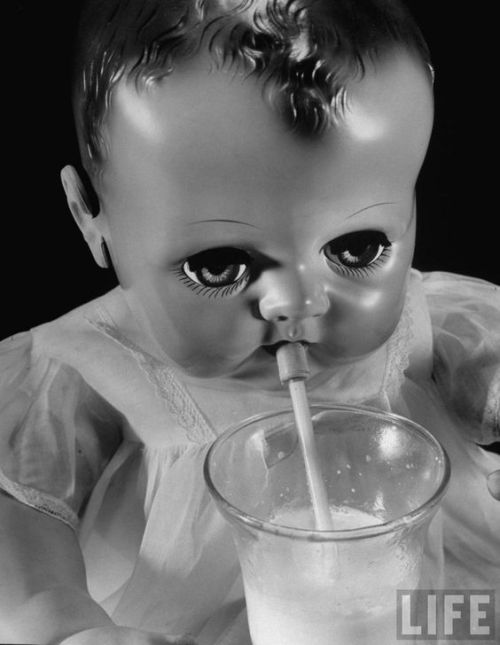 Bernard Hoffman for LIFE - Thirsty doll drinking milk. March 1950. 
