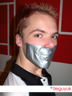 tieguyuk:  One from my personal archives for throwbackthursday. This was taken almost 10 years ago after one of my many play sessions with Sean. He’s a duct tape fanatic and I had this really wide duct tape that gave him a boner even before I gagged