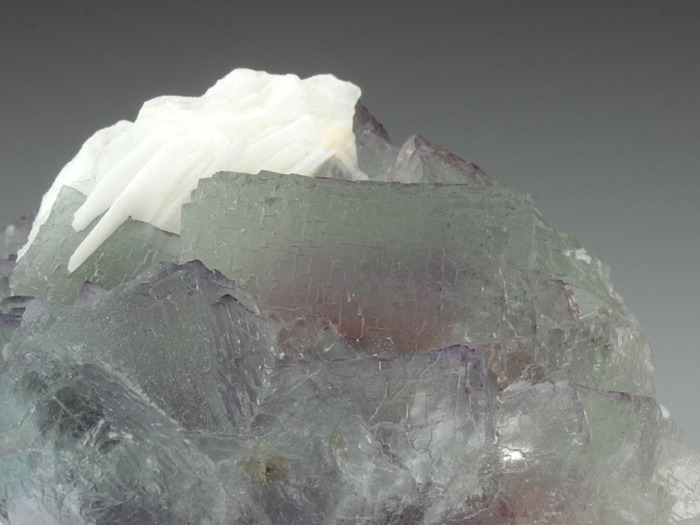 mineralists:  Beautiful specimen of Fluorite displaying a purple-pink phantom in