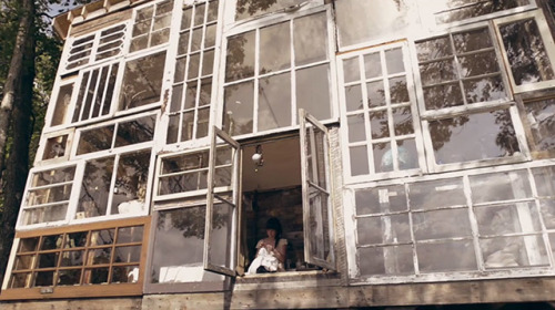 cjwho:  A House Made of Windows | via  In 2012, Nick Olson and Lilah Horwitz quit their jobs and set off to build a glass cabin in the mountains of West Virginia. Nick is a photographer who specializes in tintypes taken with a camera he made himself.