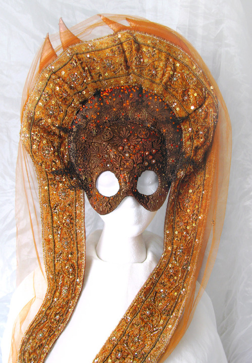 This mask- pretty much doubles as a kokoshnik- started off as the Sun but became more generally abou