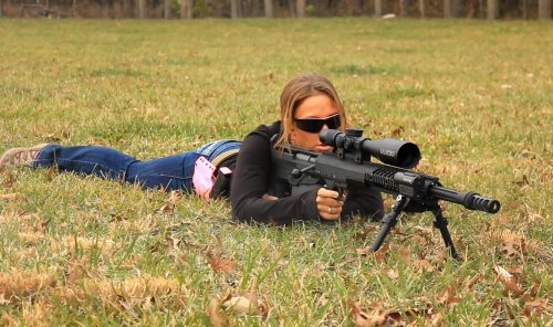 wellarmedwomen:  Erika from Range Time with Cory & Erika I realize there is no gun in the third photo, but just wanted to show off how fit she is.  She can shoot and she’s in great shape.  Good catch Cory!