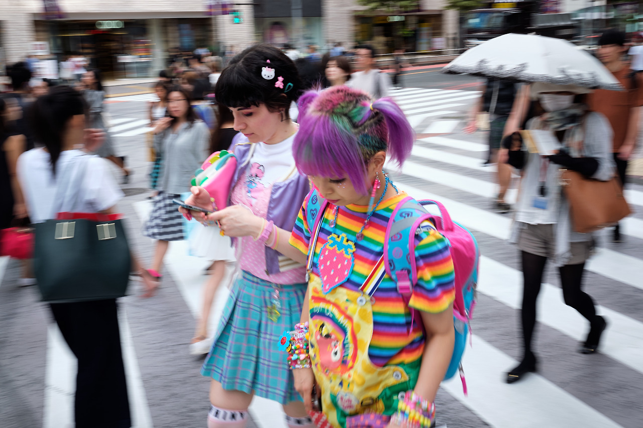 Two girls walk in Shibuya dressed with outfits boils down to the word “kawaii”. Basically, that means “cute” or “lovable” and describes the cultural aspect that has pervaded Japanese pop culture, entertainment, communication, clothing, toys. This...