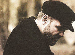 bearchaser:  let me try to sum up why this face is classily handsome and damn near perfect (for me): the full beard, the wide, chiseled jaw, the slightly pudgy tip of the nose, and perhaps most important, the downturned shape of the eyes that give him