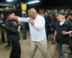 theblindninja:  Donnie Yen and   Mike Tyson on the set of Ip Man 3 