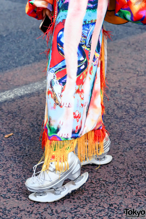 Japanese fashion designer/student Sakuran on the street in Harajuku wearing colorful handmade fashio