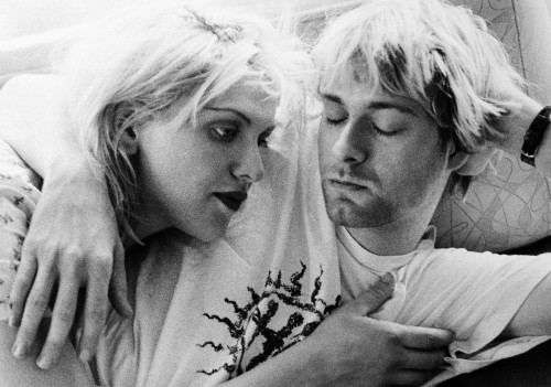 nirvananews:  Kurt Cobain wearing a Hole shirt with Courtney Love, September, 1992. 