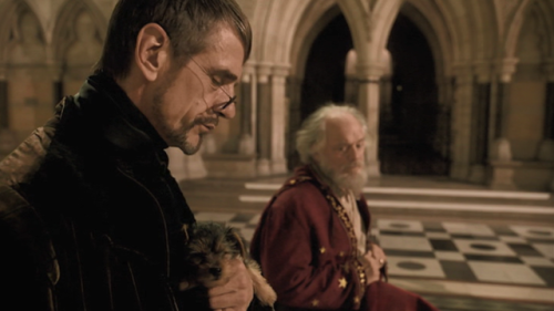 noirandchocolateeggs:Vetinari was just gently carrying around his very sleepy Wuffles puppy this ent