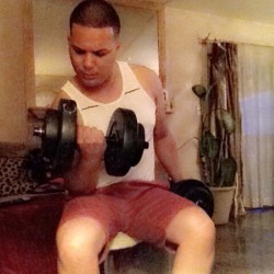 mando89:  Down time! No such thing! Working on the arms while watching some Celine Dion in concert! Getting pumped up for a night in boys town! #arms #beastmode #gettingfit #summerready 