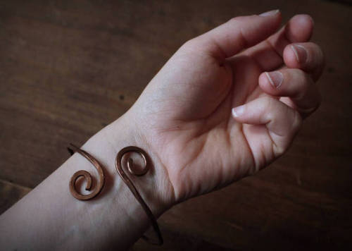 One-of-a-kind handmade copper bracelet. The bracelet is handcrafted from pure copper wire and artifi