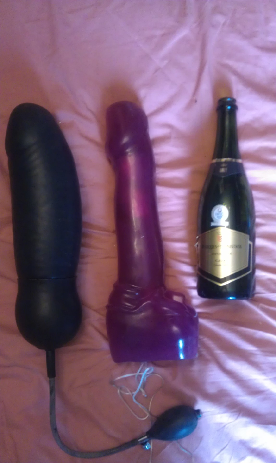 kinky-gal:  These are two of my mum’s biggest toys, the wine bottle is not just