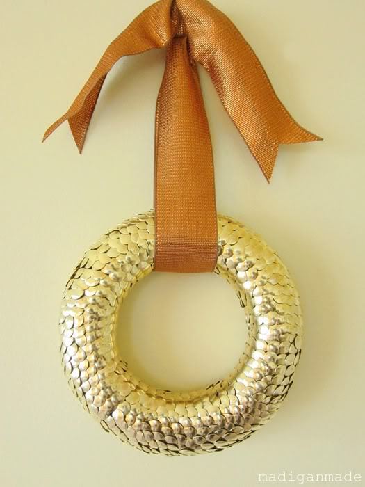 Gold Thumbtack Wreath | Madigan Made
After writing a long post, I realised I had already re-blogged this wreath. Well I guess I love it that much, so hell, I’m re-blogging it again! I think it might be because though it looks expensive, it will cost...