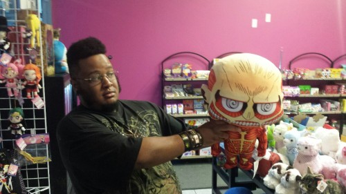 Me and thejungleofmufasa having fun with chibi Colossal Titan.  