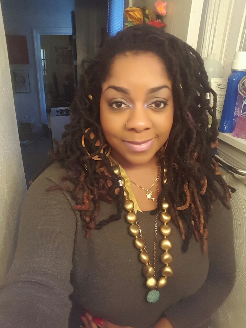 dynastylnoire:  My first move of 2k16 was taking the yarn off my locs and getting