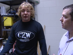 littlefuzzysheep:  rileydibiaseambrose:  Jeff Peterson Memorial Cup - 2009 Pre-match promo   Gahhh moxley you handsome cheeky fucker