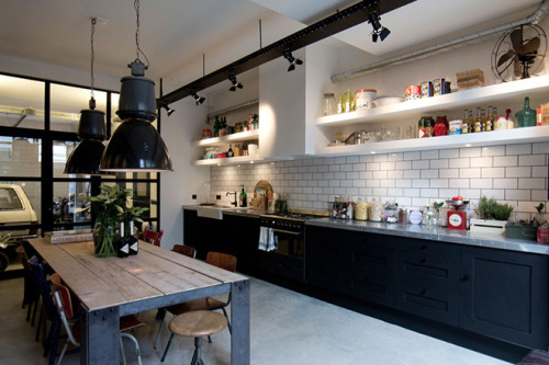 DESIGN - An old Amsterdam garage converted into an apartment.Amsterdam-based interior designers BRIC