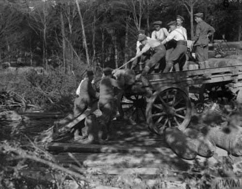 Battle of Albert. Loading 15-inch howitzer shells on to a special transport wagon. 1st July 1916.