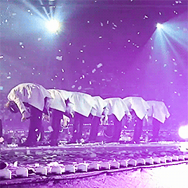 Myungsoo pats Sungjong’s hair for attention, and Jongie stretches his hand out to Myungie with