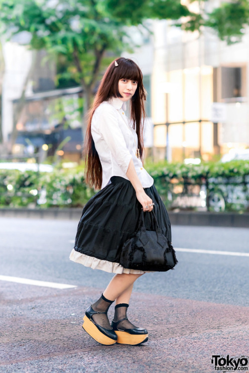 tokyo-fashion:  Married Japanese couple Kazuki and Saki - known in the Tokyo fashion scene for their shared love of Vivienne Westwood - on the street in Harajuku wearing looks by Vivienne and World’s End with jeweled devil horns, rocking horse shoes,