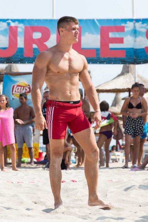 muscletits:  Cleancut stud on the beach.  He enjoys showing off in front of everyone.  He will be dealt with harshly.