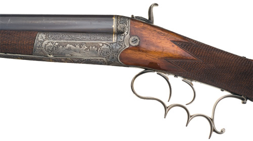 An engraved and decorated single shot sporting rifle crafted by Johann Springer of Vienna, mid 19th 