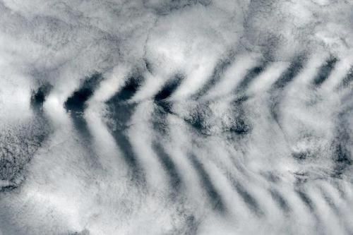 Sky Waves NASA’s Landsat 8 satellite captured this image of an interesting striped sky over the Indi