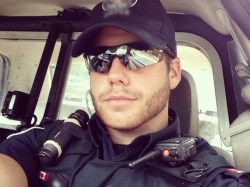 southhallspsu:  Canadian police stud.  The things I’d do to him….