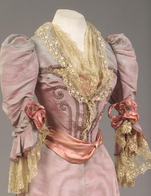 ephemeral-elegance:  Silk Moire Gown Trimmed with Faux Pearls, 1894Owned by Empress Maria FyodorovnaDesigned by House of Worthvia Hermitage Museum