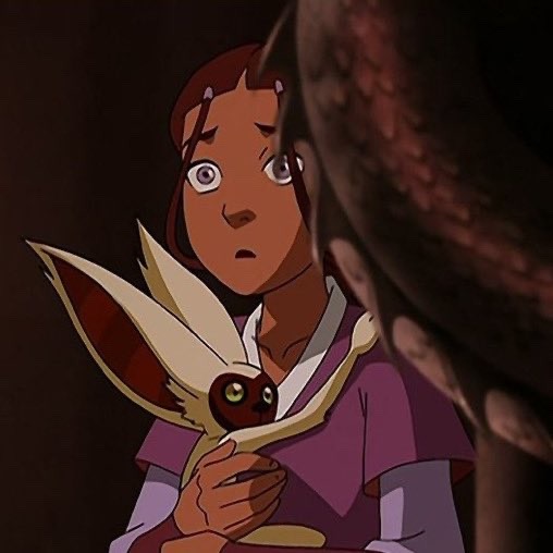 katara holding momo as in cradling a small child