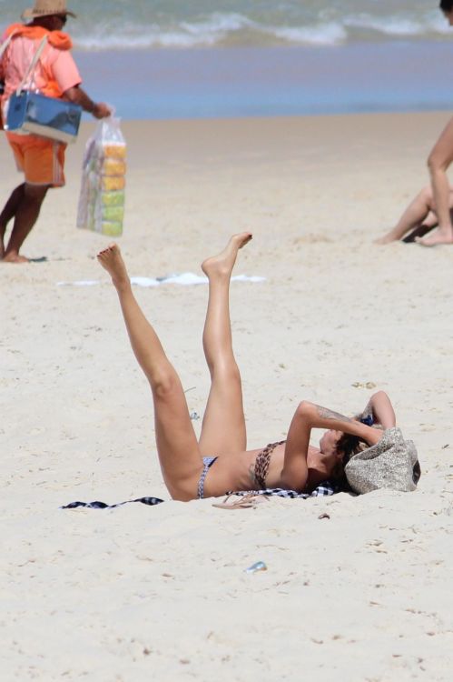 toplessbeachcelebs:  Alice Dellal (Brazilian Model) having difficulty keeping her nipples in her bikini in Rio de Janeiro (October 2013)