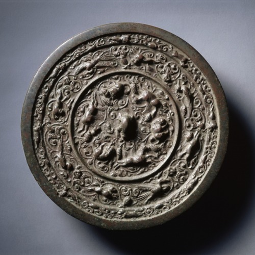 Mirror with Auspicious Animals, Celestial Horses, and Grapevines, early 1100s-mid-1200s, Cleveland M