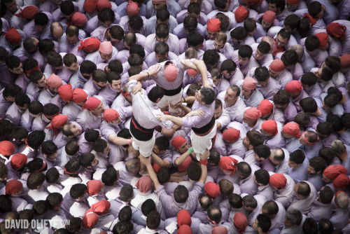 photojojo:  The mind-boggling images above were captured by David Oliete at the 2012 Human Tower Competition held in Tarragona, Spain.  Out of context, they’re kind of mysterious and moving, right? The 2012 Human Tower Competition Yields Intriguing