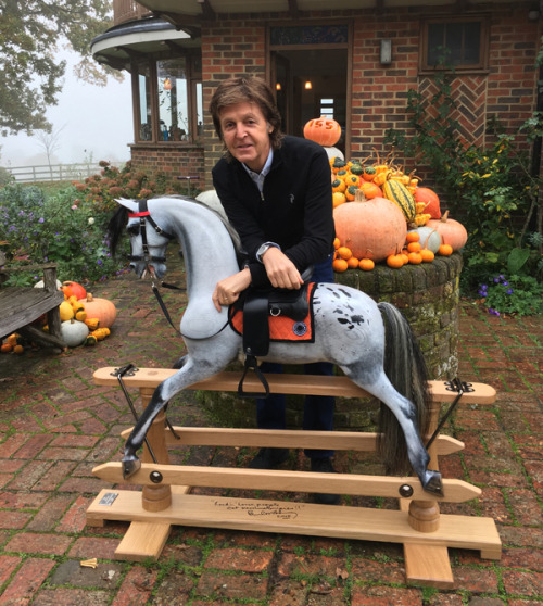 beatlebob64:Paul Signs Rocking Horse For Children’s Hospital Auction.