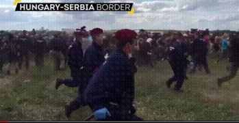 mickislove:   yourtreeman:  kropotkindersurprise:  September 8 2015 -   A Hungarian camerawoman was fired after kicking and tripping refugees, including children, running from the police. She worked for the far-right Jobbik-affiliated channel N1. This