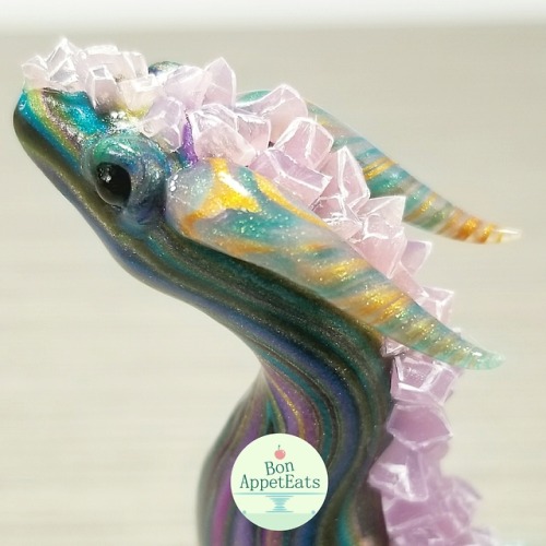 battlecrazed-axe-mage: bon-appeteats: Custom order for a peacock colored dragon with crystals. Swipe