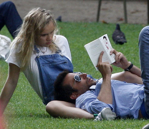 nc-17:  Bradley Cooper reading Lolita with his young girlfriend. 