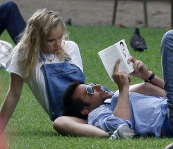 nc-17:  Bradley Cooper reading Lolita with his young girlfriend. 