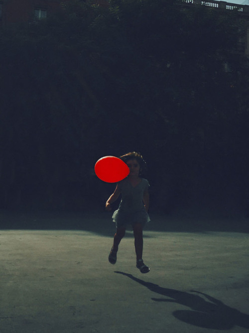 Pia with balloon in Gràcia, Barcelona, Spain. 2016.Photo by Christopher Anderson