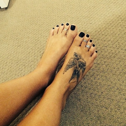 footer:  Beautiful feet of @lexkosh follow her! Her feet are perfect! #feet #toes #toerings #foot #tats #black #nailpolish #footfetish #footjob #perfectfeet #follow