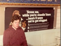 theconcretearchives:  November, 1982: It was risky taking photographs in the subway because there was a good chance you would get mugged and have your camera stolen. In the background is a poster with the words: ‘Scuse me, while you’re standin’