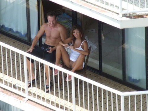 carelessnaked: In a short dress and showing her pussy from hotel balcony