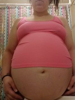 makemephat:  So massive I NEED to rest it on anything that will give this heavy belly some support. My baby shower is coming up - I know you want to see me bigger but please bring something besides cake and fattening cream. ;)