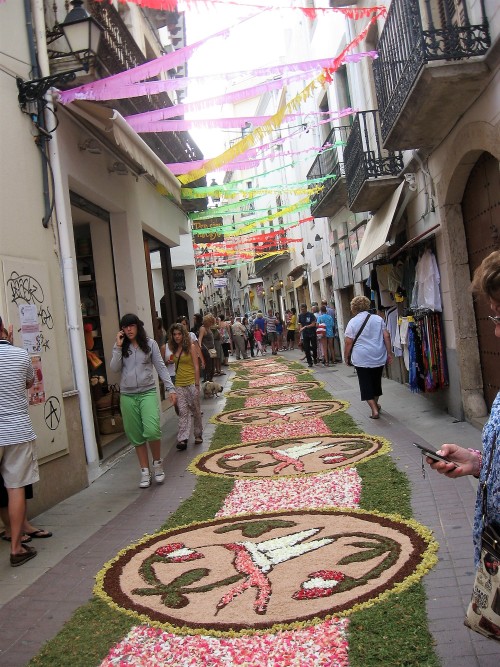 Happy International women&rsquo;s day! Flower petal carpets in Tossa de Mar.Catalonia, Spain.&nb